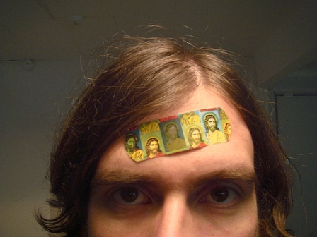 boy with plaster on his head